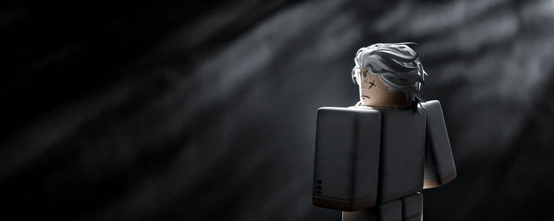 A figure in a white suit standing in a black void, framed by a dark aura